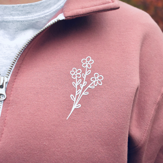 Dusty rose 1/4 zip sweater with left chest flower design in white. Made in Canada. 